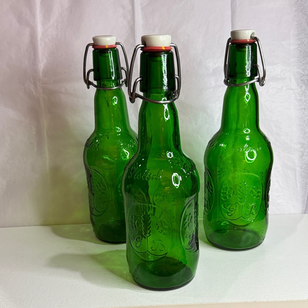 3 vintage Grolsch bottles swig tops